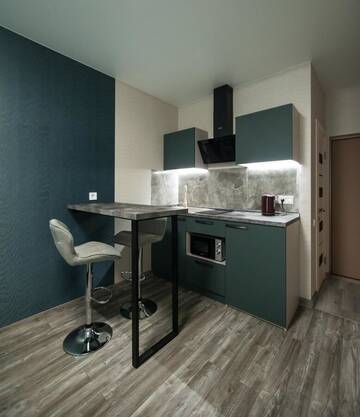 Фото номера Улучшенный номер-студио Апартаменты Solo Apartment Kamenskaya г. Киев 3