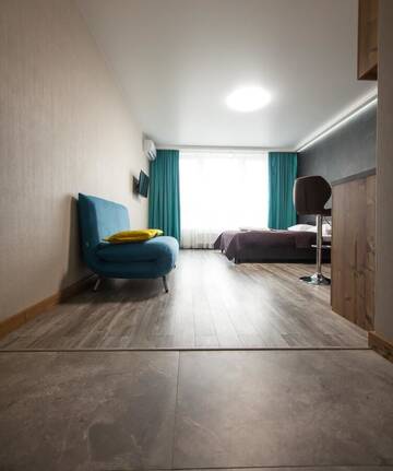 Фото номера Апартаменты Делюкс Апартаменты Solo Apartment Kamenskaya г. Киев 4