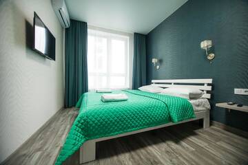 Фото номера Улучшенный номер-студио Апартаменты Solo Apartment Kamenskaya г. Киев 4