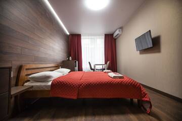 Фото номера Двухместный номер Делюкс с 1 кроватью Апартаменты Solo Apartment Kamenskaya г. Киев 3