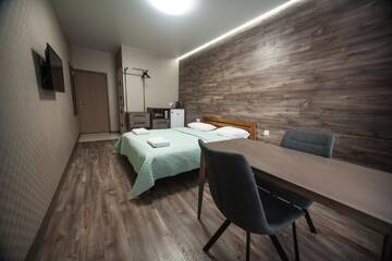 Фото номера Номер-студио с кроватью размера &quot;king-size&quot; Апартаменты Solo Apartment Kamenskaya г. Киев 7