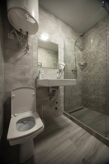 Фото номера Номер-студио Апартаменты Solo Apartment Kamenskaya г. Киев 8