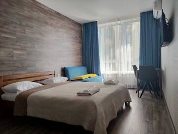 Фото номера Номер-студио с кроватью размера &quot;king-size&quot; Апартаменты Solo Apartment Kamenskaya г. Киев 8