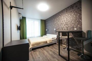 Фото номера Номер-студио Апартаменты Solo Apartment Kamenskaya г. Киев 3