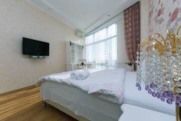 Фото номера Апартаменты Апартаменты Panoramic luxury apartments with Jacuzzi Obolonskaya embankment г. Киев 11