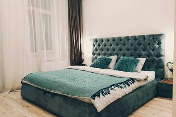 Фото номера Апартаменты с 1 спальней Апартаменты Homie Bali Podil Apt г. Киев 3