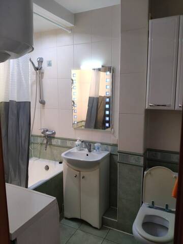 Фото номера Апартаменты с 1 спальней Апартаменты Cozy one bedroom apartment г. Киев 10