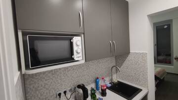 Фото номера Апартаменты с 1 спальней Апартаменты Rybalsky Studio Apartment Podil - Dnipro View г. Киев 11