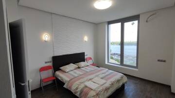Фото номера Апартаменты с 1 спальней Апартаменты Rybalsky Studio Apartment Podil - Dnipro View г. Киев 25