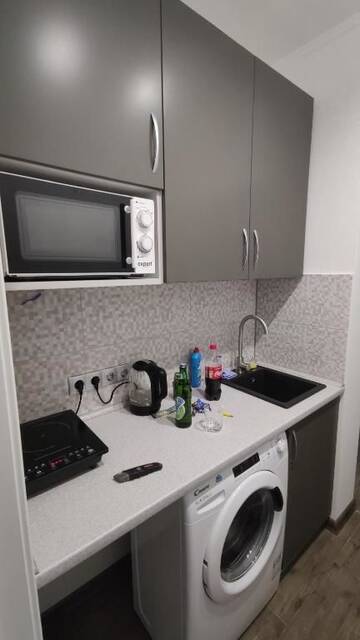 Фото номера Апартаменты с 1 спальней Апартаменты Rybalsky Studio Apartment Podil - Dnipro View г. Киев 23