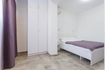 Фото номера Двухместный номер с 1 кроватью Отель SkyHome na Nauky г. Киев 5