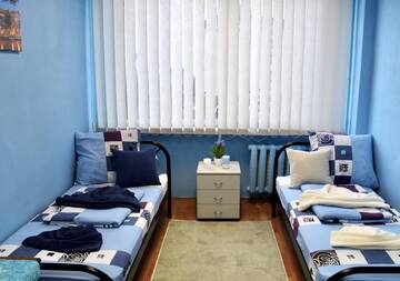 Фото номера Двухместный номер с 2 отдельными кроватями Хостелы UKRHOUSING г. Киев 8
